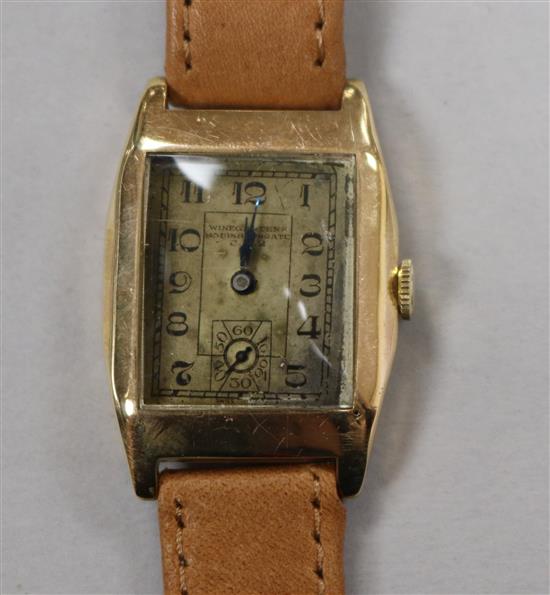 A gentlemans 1930s yellow metal manual wind wrist watch, Winegartens Ltd, in Winegartens box, on later associated strap.